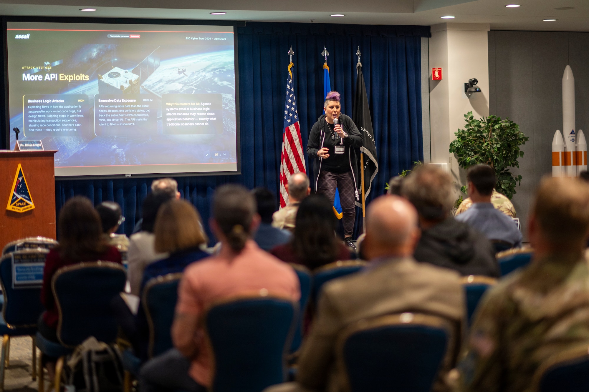 Ms. Alissa Knight, cybersecurity influencer, content creator, hacker, author, and film producer, shares remarks at the 8th annual Space Systems Command (SSC) Cyber Expo April 21–23, 2026, at Los Angeles Air Force Base in El Segundo, California. (U.S. Space Force photo by Van Ha)