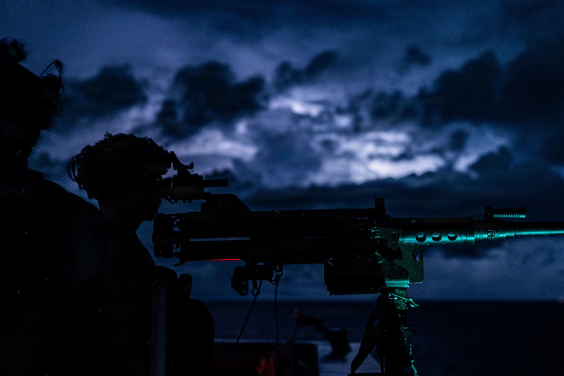 U.S. Marine Corps Sgt. Bryan Avalos, a section chief with Echo Battery, Battalion Landing Team 3/5, 11th Marine Expeditionary Unit, stands post aboard San Antonio-class amphibious transport dock ship USS Portland (LPD 27) while transiting the Surigao Strait, May 2, 2026.