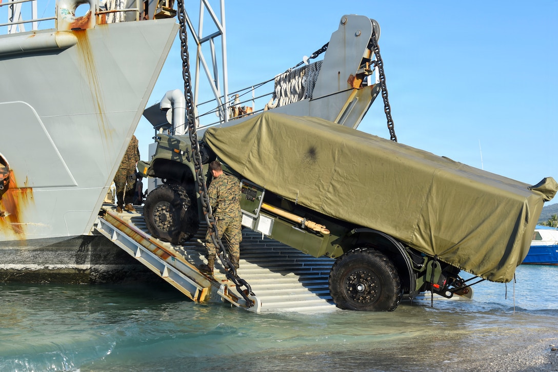 U.S. Marine operates a Navy-Marine Expeditionary Ship Interdiction System on to a U.S. Army Landing Craft Utility during Exercise Balikatan 2026 at Calayan, Cagayan, Philippines, May 2, 2026.