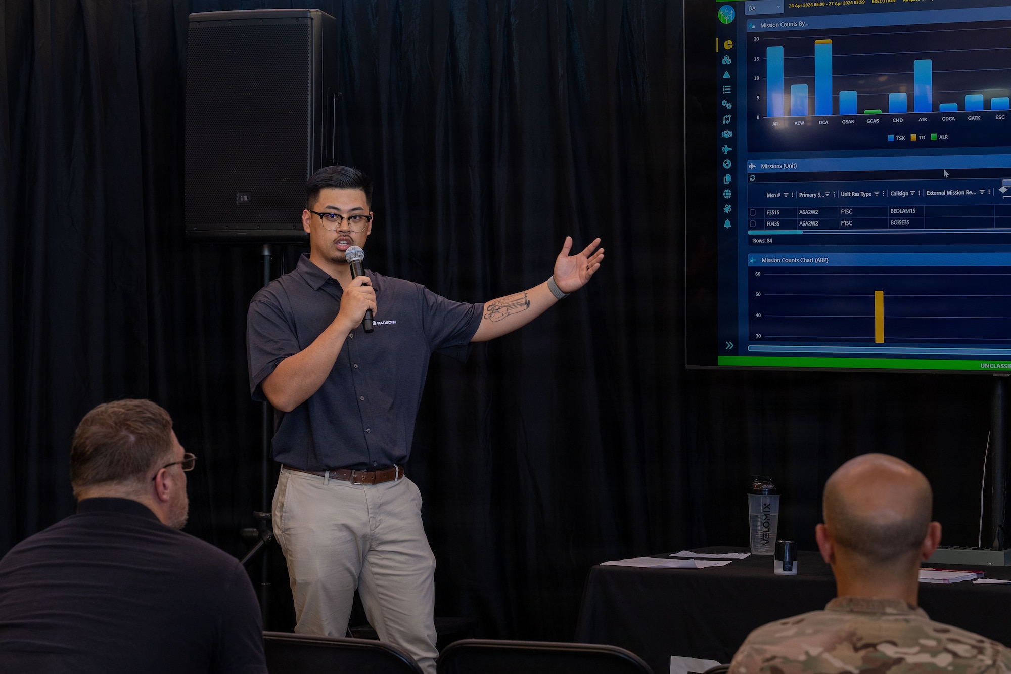 An industry partner briefs joint force attendees on artificial intelligence capabilities during Pacific Operator Training Day at Joint Base Pearl Harbor-Hickam, Hawaii, April 28, 2026.