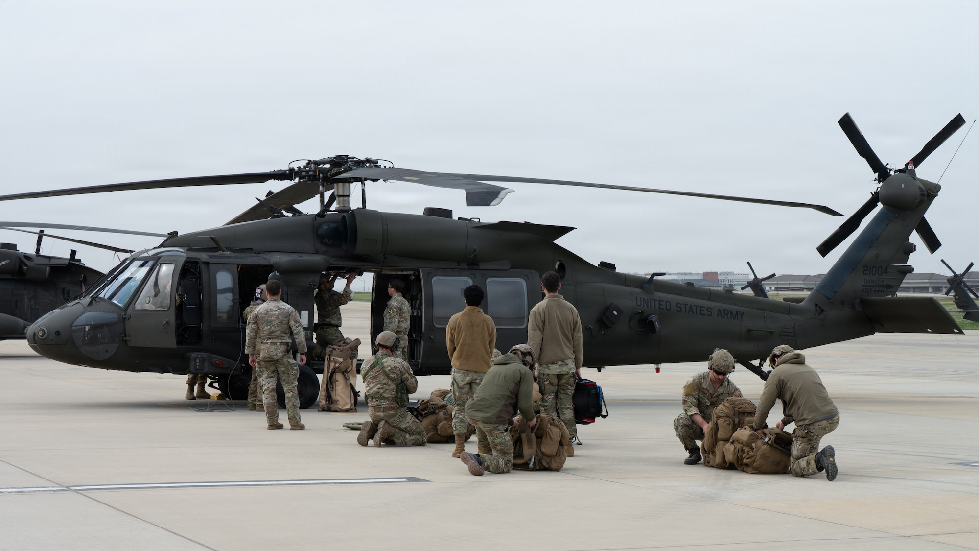 U.S. Air Force Tactical Air Control Party operators assigned to the 604th Air Support Operations Squadron conduct preflight checks on a UH-60 Black Hawk at Camp Humphreys, Republic of Korea, April 21, 2026. TACP operators were tasked with finding critical targets during exercise Freedom Flag 26-1 to enable dynamic targeting for the 607th Air Operations Center. FF 26-1 is a combined exercise between U.S. and Republic of Korea air forces on the Korean peninsula designed to enhance readiness through realistic, complex training scenarios. (U.S. Air Force photo by Senior Airman Jessica Mun)