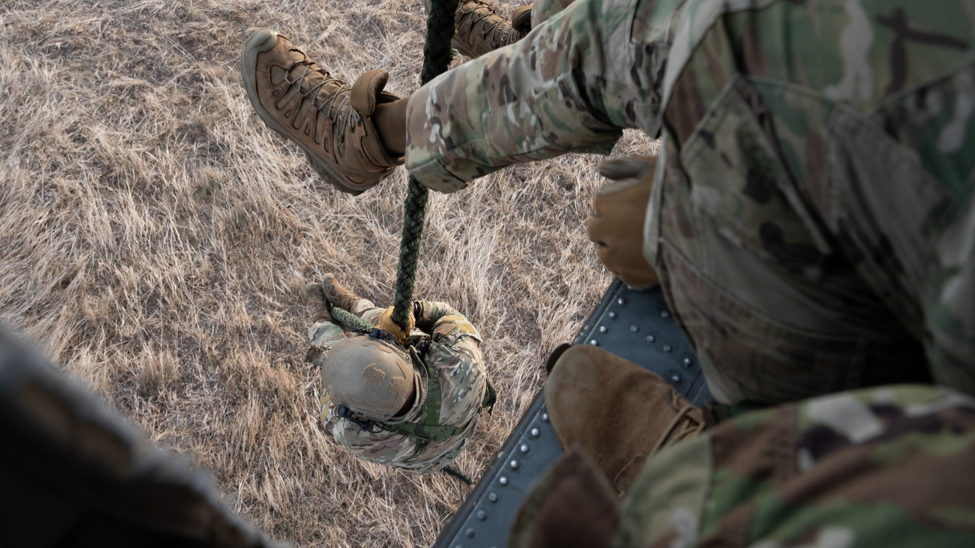 U.S. Air Force Tactical Air Control Party operators assigned to the 604th Air Support Operations Squadron, practice Fast Rope Insertion Extraction System out of a UH-60 Black Hawk at Sobaeksan National Park, Republic of Korea, April 21, 2026. TACP operators spent a total of six days in the field, moving over mountainous terrain to track targets while using advanced communication waveforms to pass critical data to the 607th Air Operations Center during exercise Freedom Flag 26-1. FF 26-1 is a combined exercise between U.S. and Republic of Korea air forces on the Korean peninsula designed to enhance readiness through realistic, complex training scenarios. (U.S. Air Force photo by Senior Airman Jessica Mun)