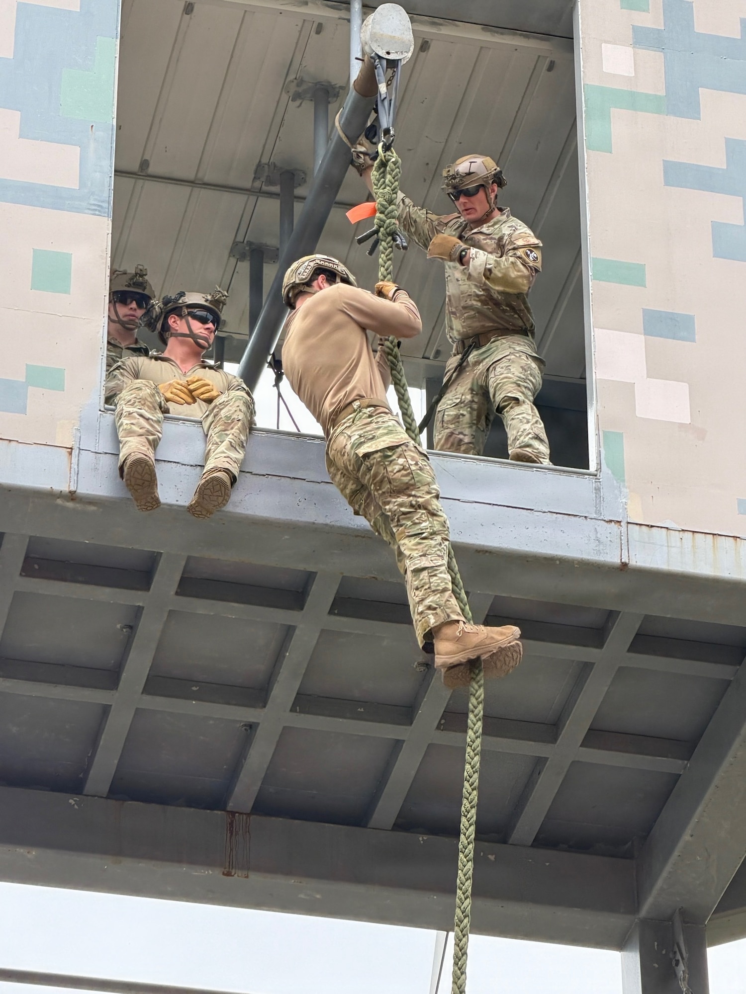 U.S. Air Force Tactical Air Control Party operators assigned to the 604th Air Support Operations Squadron conduct fast rope insertion training during exercise Freedom Flag 26-1 at Camp Humphreys, Republic of Korea, April 21, 2026. TACP operators spent a total of six days in the field, moving over mountainous terrain to track targets while using advanced communication waveforms to pass critical data to the 607th Air Operations Center. FF 26-1 is a combined exercise between U.S. and Republic of Korea air forces on the Korean peninsula designed to enhance readiness through realistic, complex training scenarios. (U.S. Air Force photo by Capt. Nicholas Lawson)