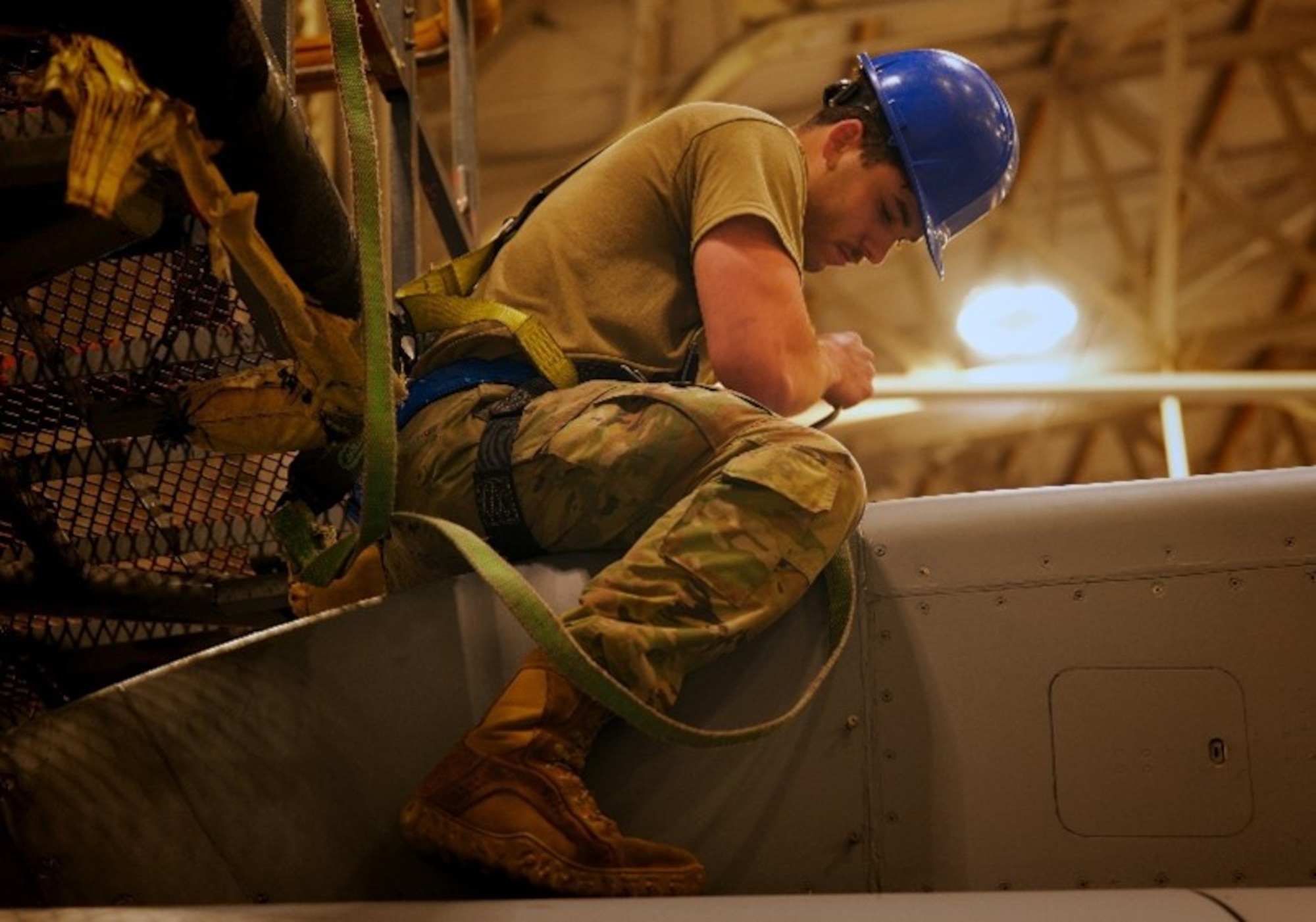 U.S. Air Force Airman 1st Class David Hand, 305th Aircraft Maintenance Squadron C-17 Globemaster III aircraft aerospace propulsion journeyman, removes a panel from an engine of a C-17 Globemaster III aircraft for repairs and repainting at Joint Base McGuire-Dix-Lakehurst, N.J., April 21, 2026. The 305th AMXS received the 2025 Air Mobility Command Maintenance Effectiveness Award in the Small Aircraft Maintenance Unit category, showcasing themselves as one of AMC’s most effective maintenance squadrons. (U.S. Air Force photo by 2nd Lt. Gabriel Davenport)