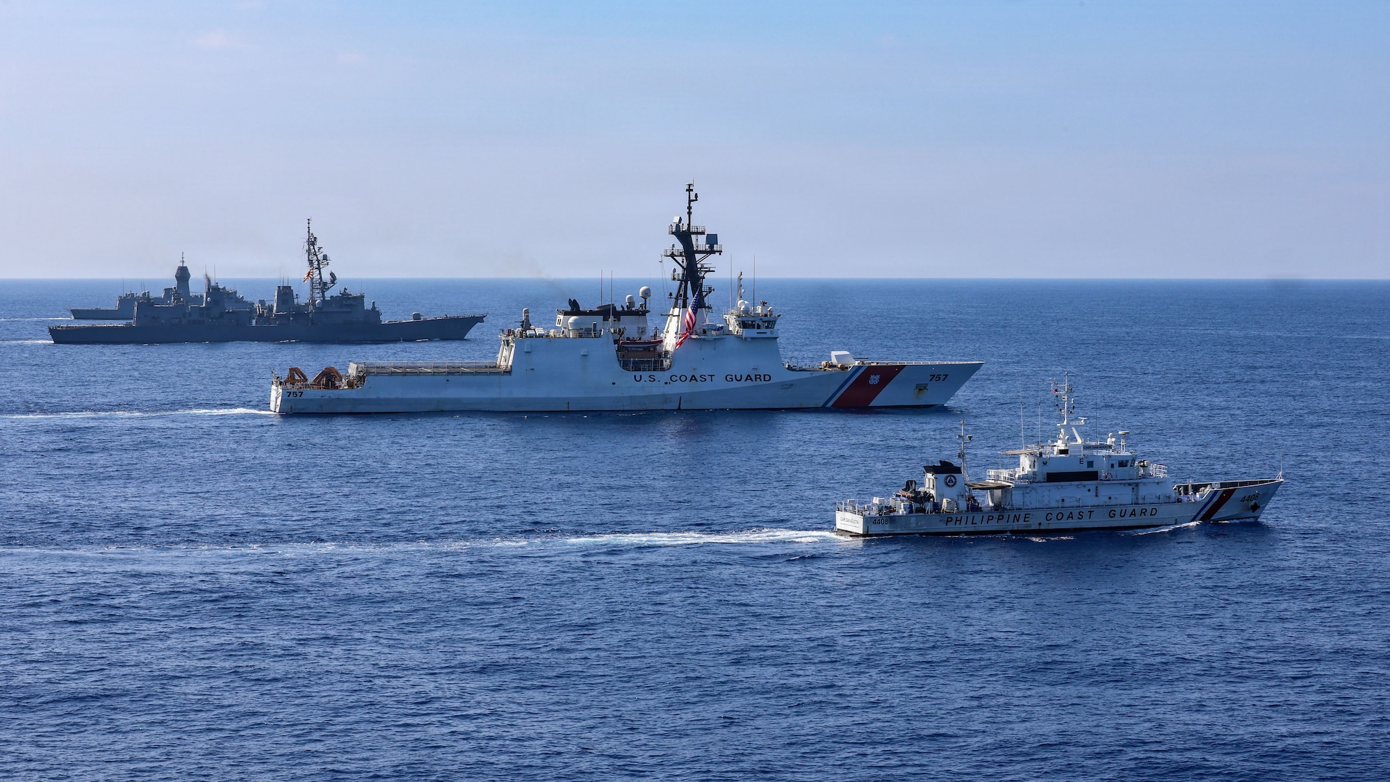 From front, Philippine Coast Guard Parola-class patrol vessel BRP Cape San Agustin (MRRV 4408), U.S. Coast Guard Legend-class cutter USCGC Midgett (WMSL 757), Japan Maritime Self-Defense Force Murasame-class destroyer JS Ikazuchi (DD 107) and Royal Australian Navy Anzac-class frigate HMAS Toowoomba (FFH 156) cruise in formation during a group sail exercise for Exercise Balikatan 2026 in the South China Sea, April 28, 2026. Balikatan is a longstanding annual exercise between the Armed Forces of the Philippines and U.S. military that represents the strength of our alliance, improves our capable combined force, and demonstrates our commitment to regional peace and prosperity. (U.S. Navy photo by Mass Communication Specialist 1st Class John B. Hetherington)