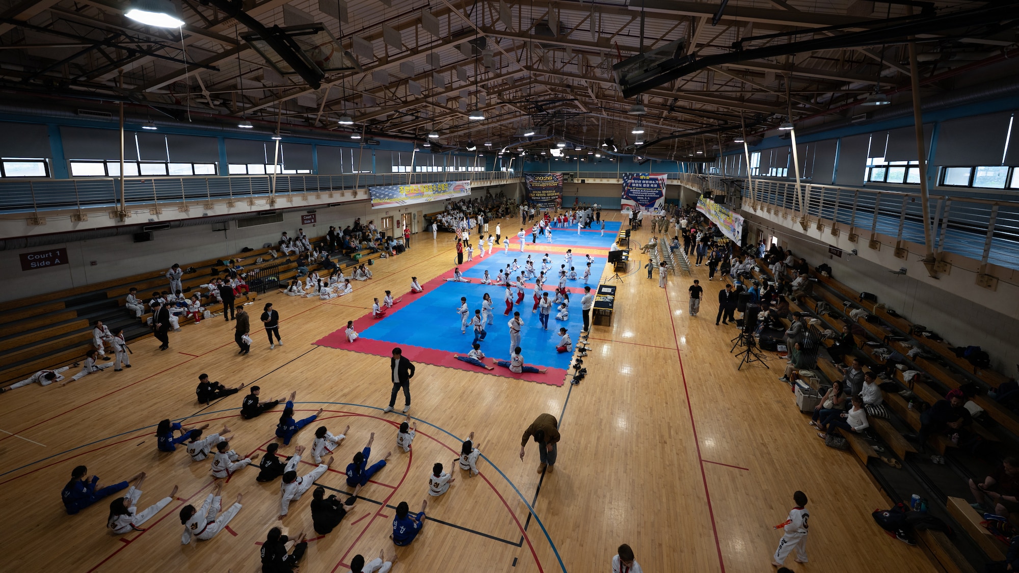 Participants of the 5th Annual Republic of Korea-U.S. Friendship Children & Family Taekwondo Exhibition Festival gather in the base gym at Osan Air Base, ROK, May 2, 2026.