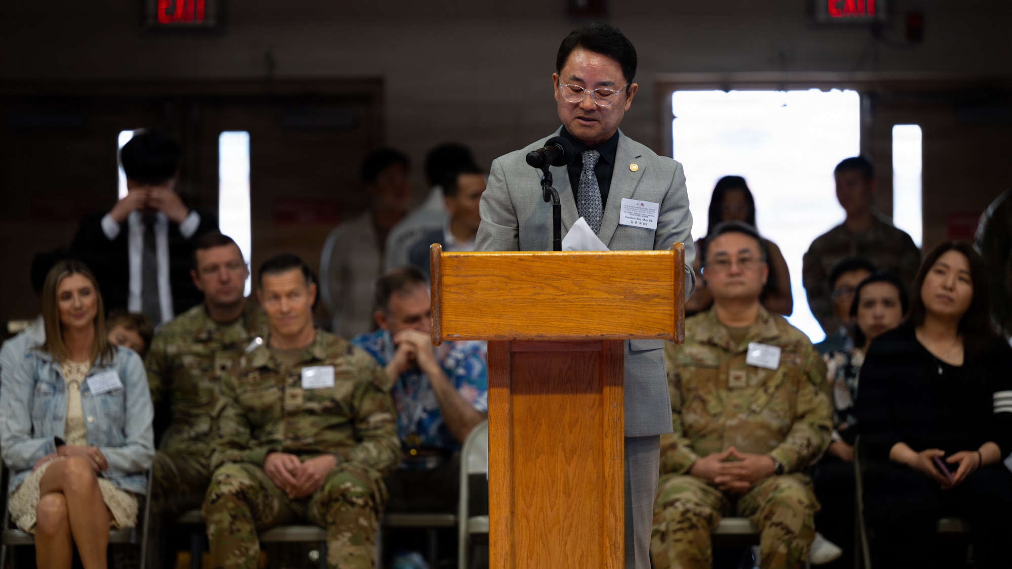 Mr. Kim Mun Ok, Foreigners Taekwondo Cultural Association president, delivers opening remarks during the 5th Annual Republic of Korea-U.S. Children Friendship Taekwondo Exhibition Festival at Osan Air Base, ROK, May 2, 2026.