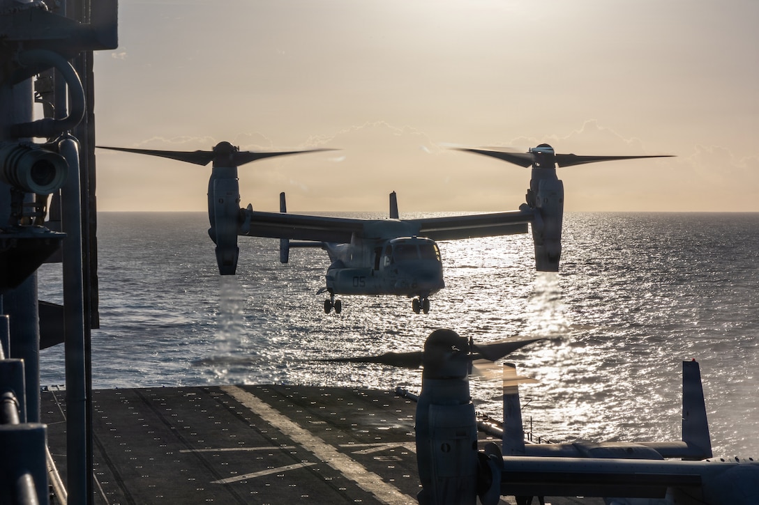 A U.S. Marine Corps MV-22B Osprey tiltrotor aircraft with Marine Medium Tiltrotor Squadron (VMM) 263 (Reinforced), 22nd Marine Expeditionary Unit (Special Operations Capable), prepares to land aboard Wasp-class amphibious assault ship USS Iwo Jima (LHD 7) during flight operations while underway in the Caribbean Sea, April 29, 2026. U.S. military forces are deployed to the Caribbean in support of the U.S. Southern Command mission, Department of War-directed operations, and the president’s priorities to disrupt illicit drug trafficking and protect the homeland. (U.S. Marine Corps photo)