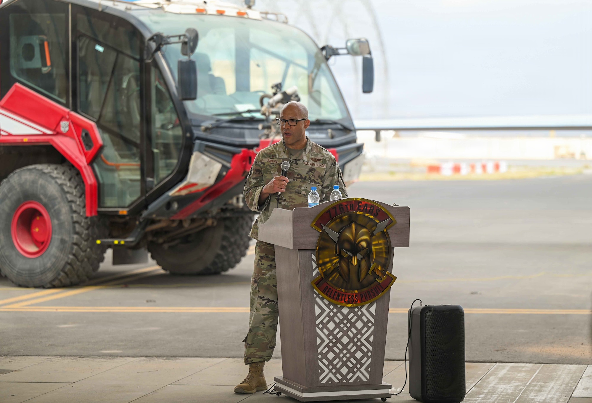U.S. Air Force Col. Kris Aikens, 449th Air Expeditionary Commander, gives remarks during a change of command ceremony at Chabelley Airfield, Djibouti, April 24, 2026. The ceremony celebrated the successful tenure of outgoing 776th Expeditionary Air Base Squadron commander U.S. Air Force Lt. Col Lawrence Melnicoff.  (U.S. Army photo by SGT Vivian Nakaana)