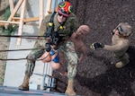 Utah National Guard Senior Airman Gordon Pexton, medic assigned to the 151st Medical Group, performs an extraction of a mannequin at Camp W. G. Williams, Utah, in support of Exercise Wolverine April 30, 2026. Through realistic training and innovative operational concepts, Exercise Wolverine strengthens the Utah National Guard’s ability to respond rapidly to crisis, support civil authorities and defend the homeland whenever and wherever the nation calls. Photo by Senior Airman Kyle Blackham.
