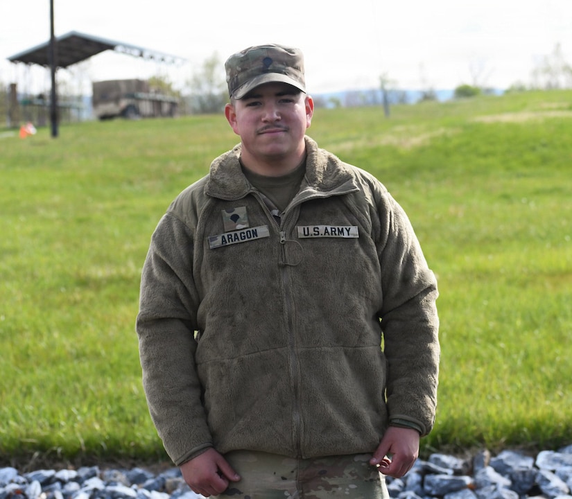 U.S. Army Spc. Kayden Aragon, a motor transport operator assigned to the 121st Transportation Company, 228th Motor Transportation Battalion, 213th Regional Support Group, Pennsylvania Army National Guard, stands for a portrait while guarding the entrance to a firing range during annual rifle marksmanship qualification at Fort Indiantown Gap, Pennsylvania, May 2, 2026. U.S. Soldiers with the 228th MTB qualified on the M4 carbine, demonstrating their ability to effectively operate their weapons and successfully complete their missions. (U.S. Army National Guard photo by Spc. Aliyah Vivier)