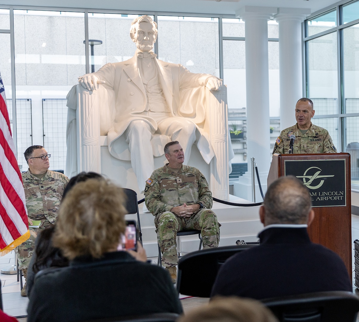 Chief Warrant Officer 5 Michael Maroon, Commander of Detachment 5, Company A, 2nd Battalion, 245th Aviation Regiment, addresses Detachment Soldiers, family members, and friends, during the unit’s mobilization ceremony May 4 at the Abraham Lincoln Capital Airport in Springfield.