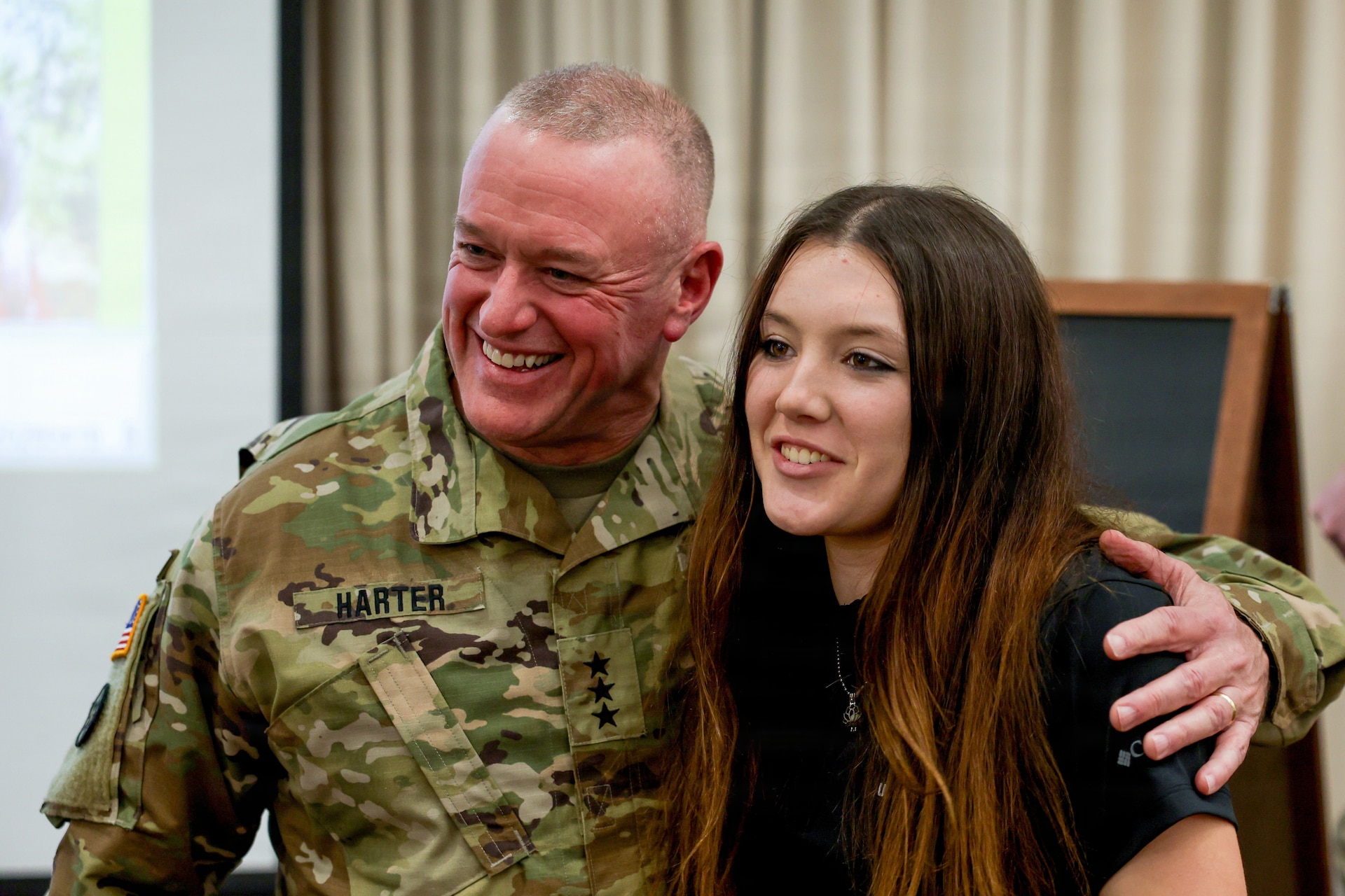 Lt. Gen. Robert Harter, the 35th Chief of Army Reserve, poses for a photo with Cadet Jordyn Hoit, a Minuteman Scholarship recipient currently attending Hofstra University.