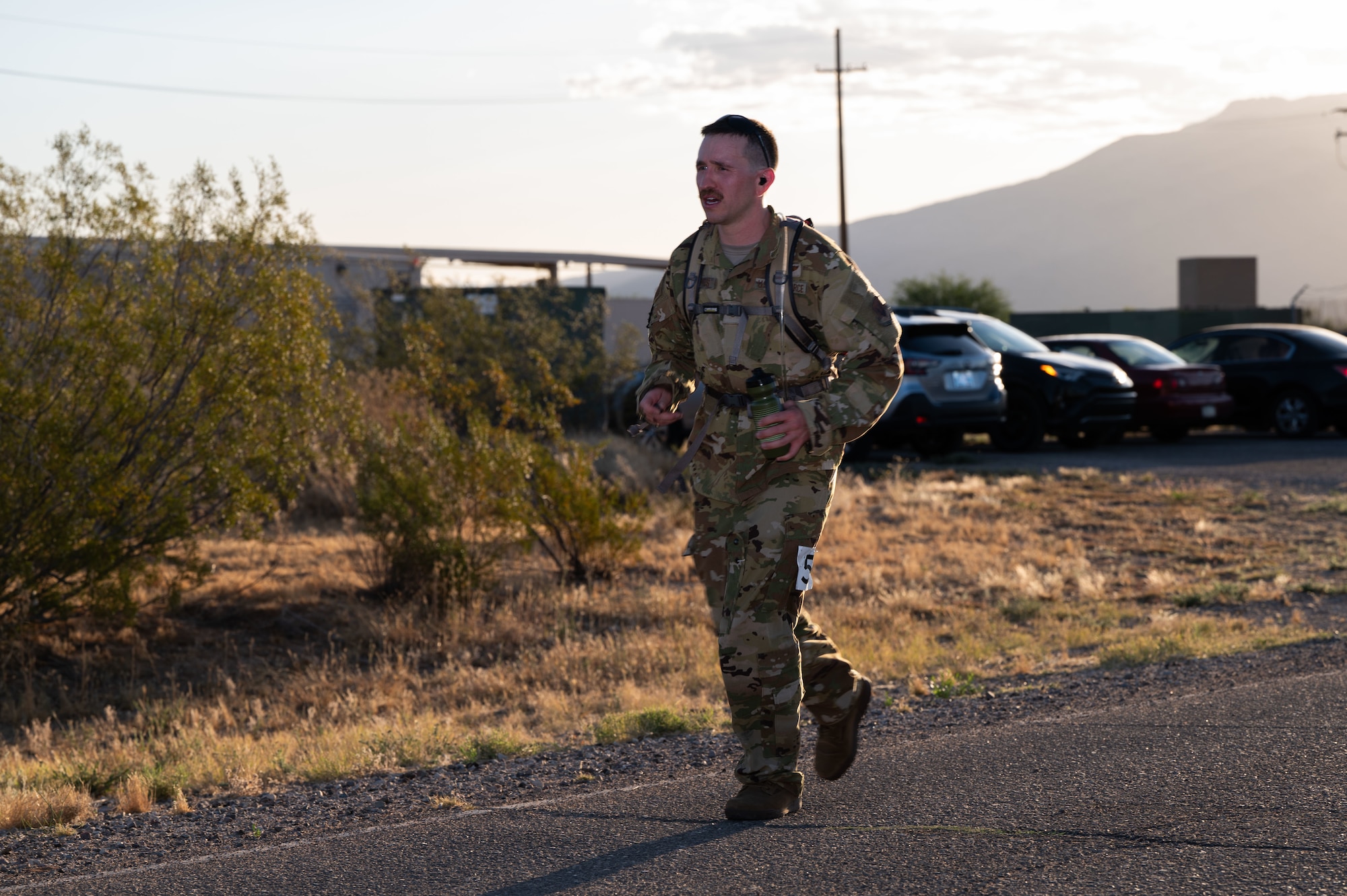 U.S. Air Force Staff Sgt. Nicholas McGinnis, an ISR operator assigned to the 42nd Electronic Combat Squadron, participates in the Norwegian Foot March held at Davis-Monthan Air Force Base, Arizona, May 2, 2026. McGinnis was one of the first participants to cross the finish line in just over four hours. (U.S. Air Force photo by Airman Najzee Kuzu)