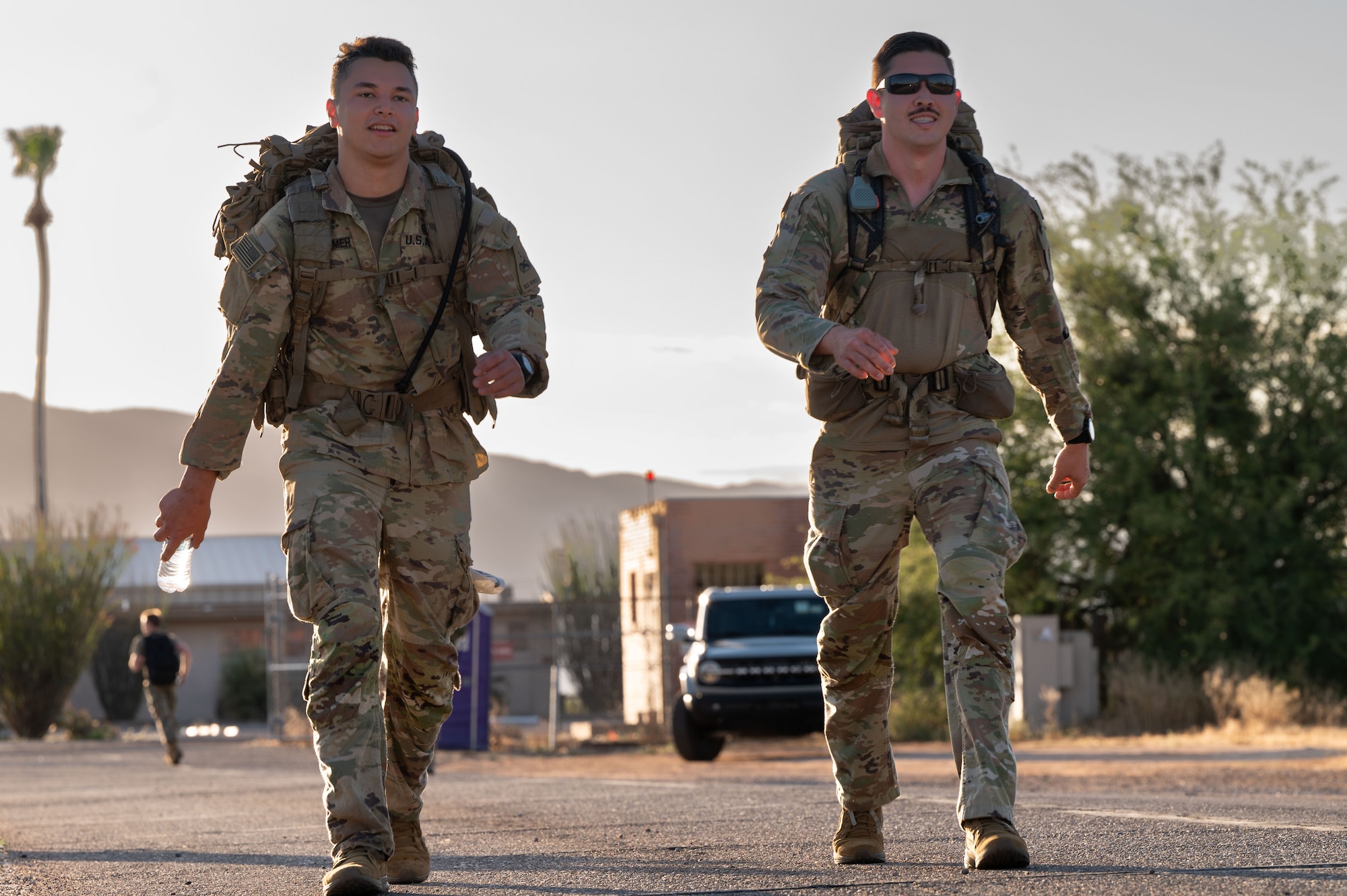 U.S. Air Force Airmen participate in the Norwegian Foot March held at Davis-Monthan Air Force Base, Arizona, May 2, 2026. Originating in Norway as a military endurance test, the ruck march consists of an 18.6-mile march while carrying a pack that weighs at least 25 pounds. (U.S. Air Force photo by Airman Najzee Kuzu)