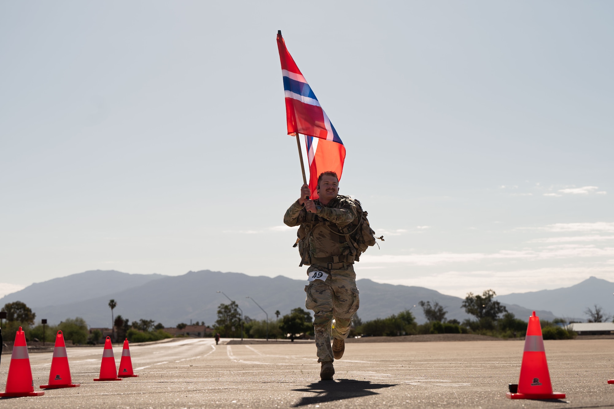 A U.S. Army Soldier crosses the finish line of the Norwegian Foot March held at Davis-Monthan Air Force Base, Arizona, May 2, 2026. Events like the Norwegian Foot March are a prime example of how DM service members maintain mission readiness at all times. (U.S. Air Force photo by Airman Najzee Kuzu)