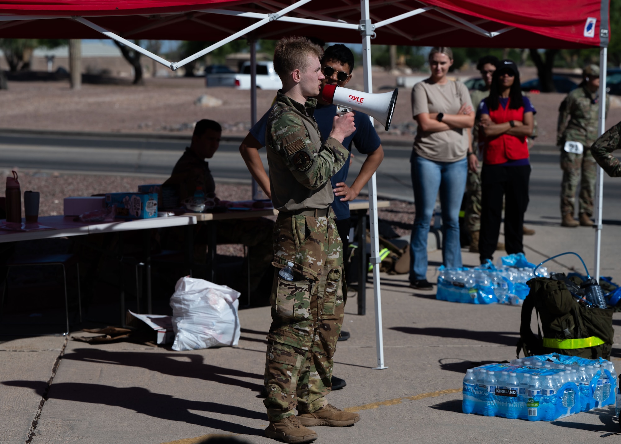 U.S. Air Force Airman 1st Class Riley Friede, an EA-37B student assigned to the 42nd Electronic Combat Squadron, gives closing remarks at the first Norwegian Foot March at Davis-Monthan Air Force Base, Arizona, May 2, 2026. Friede helped coordinate the event and participated in the march. (U.S. Air Force photo by Airman Najzee Kuzu)