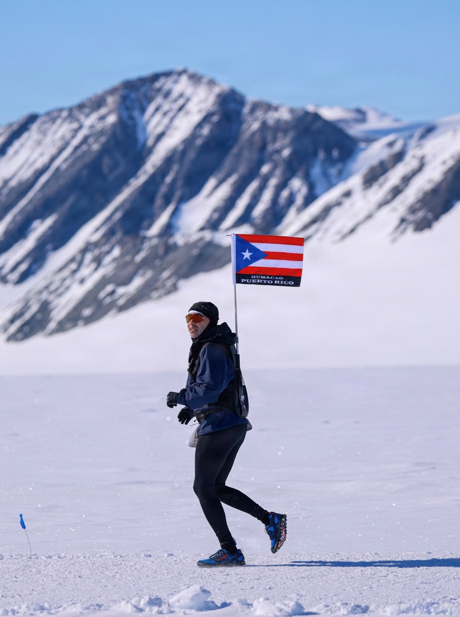 U.S. Air Force Col. Alfredo “Juny” Laboy runs during the Antarctica Ice Marathon, Nov. 29, 2025. Racing in extreme cold and isolated terrain, Laboy built endurance foundational to his pursuit of completing all seven World Marathon Majors within a single calendar year. (Courtesy photo)