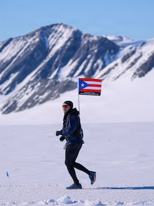 U.S. Air Force Col. Alfredo “Juny” Laboy runs during the Antarctica Ice Marathon, Nov. 29, 2025. Racing in extreme cold and isolated terrain, Laboy built endurance foundational to his pursuit of completing all seven World Marathon Majors within a single calendar year. (Courtesy photo)