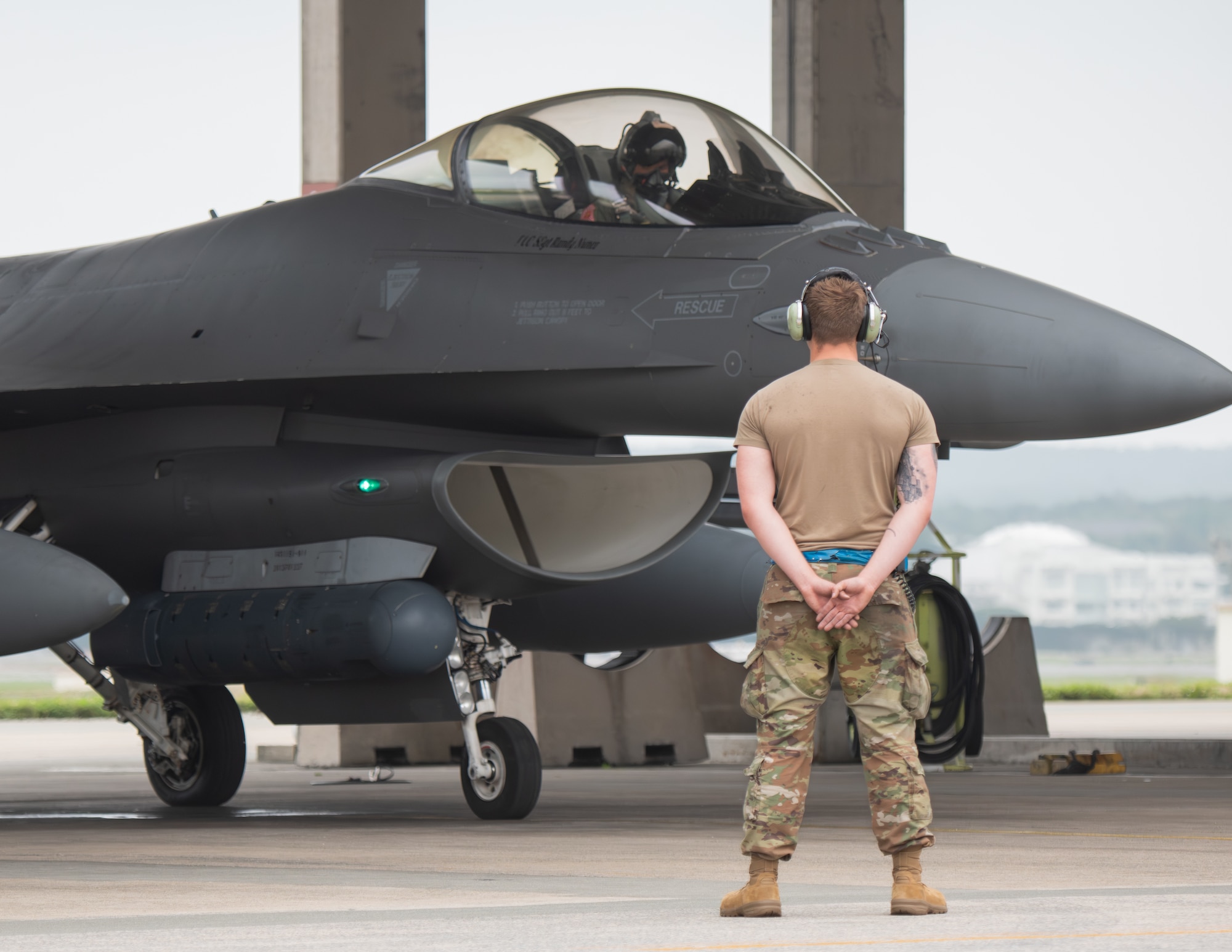 Members of the Colorado Air National Guard prepare to launch an F-16C Fighting Falcon aircraft at Kadena Air Base, Japan, April 8, 2026. The COANG is participating in a mass joint exercise that involves multiple combined operations and branches of the U.S. military throughout the Indo-Pacific area of responsibility. (U.S. Air National Guard photo by Staff Sgt. Lucarrio Lovato)