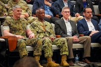U.S. Marine Corps Gen. Christopher Mahoney, Vice Chairman of the Joint Chiefs of Staff and U.S. Naval War College (NWC) President Rear Adm. Darryl Walker, observe a discussion after the Deterrence and Escalation Game and Review (DEGRE) wargame onboard Naval Station Newport, April 17, 2026.