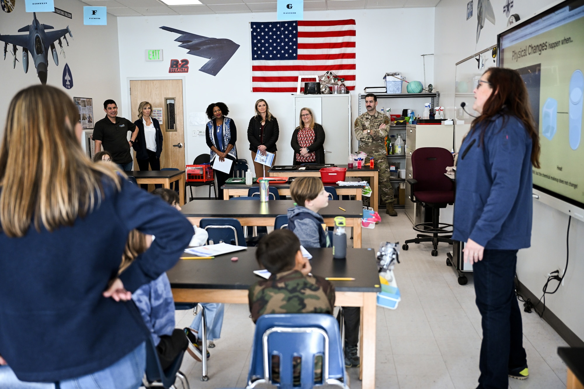 (Center, from left) Natalie Hawkins, spouse of Lt. Gen. Stacey Hawkins, Air Force Sustainment Center commander, Dr. Becky Andrle, spouse of Col. Craig Andrle, 388th Fighter Wing commander, and Tammy Holland, spouse of Col. Jeffrey Holland, 75th Air Base Wing commander, visit a Starbase classroom during a tour of Hill Air Force Base, Utah, Nov. 15, 2022. (U.S. Air Force photo by R. Nial Bradshaw)