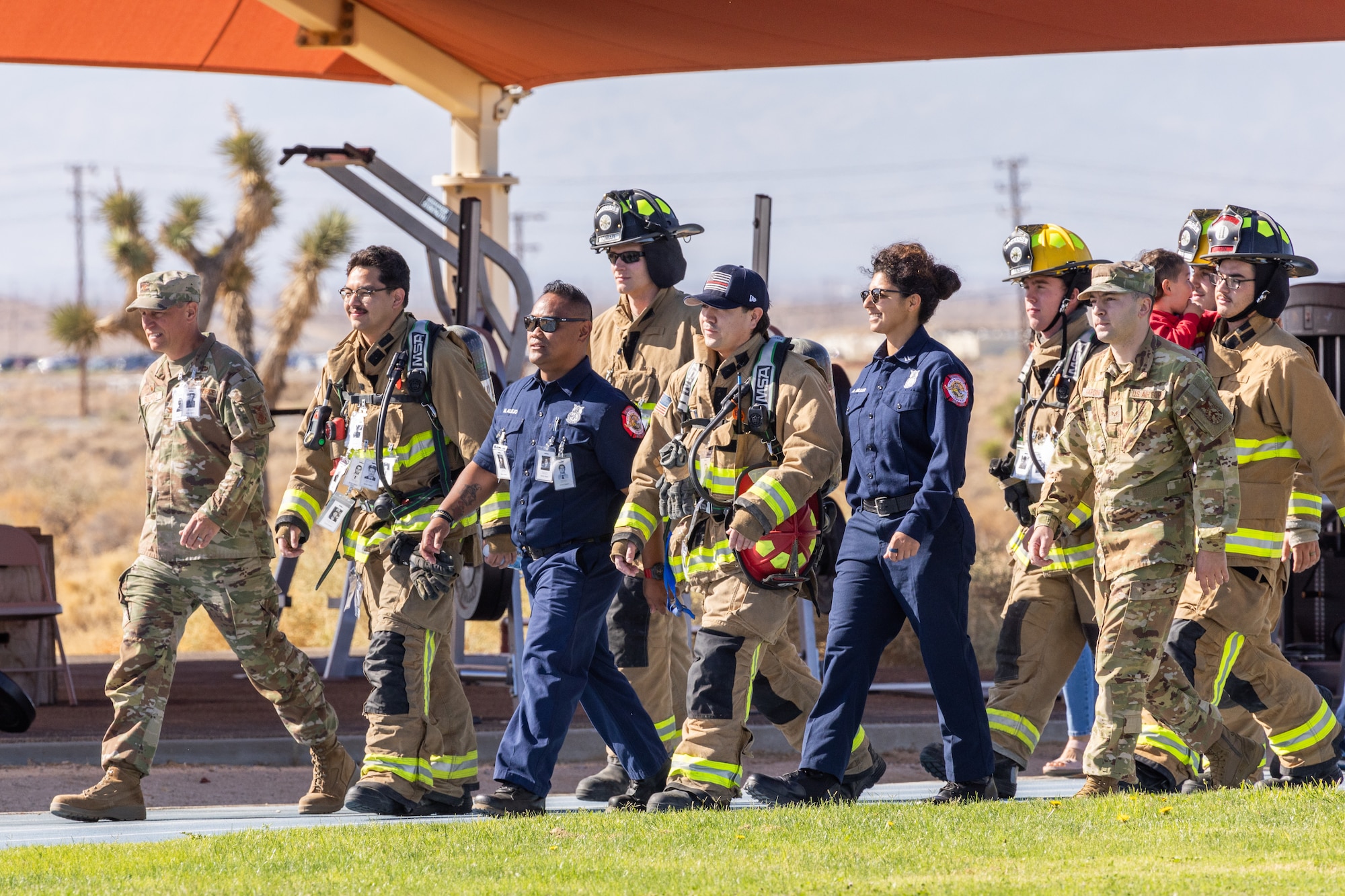 Col. Bradly Bucholz, 412th Civil Engineer Group commander, leads a group of fellow CE teammates during the 9/11 Remembrance Run/Walk/March event on Edwards Air Force Base, California, Sept. 11, 2025. (Air Force photo by Daniel Kelley)