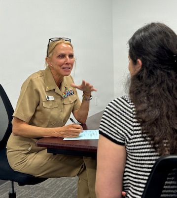 SAN DIEGO (April 29, 2026) – Lt. Cmdr. Shelly McCarter, Naval Medical Center San Diego (NMCSD) Gastroenterology Department head, speaks with a candidate during a civilian hiring event held at Laurus College. Department heads and hiring managers conducted on-site interviews throughout the day to recruit top talent for roles directly supporting NMCSD's strategic capability expansions. The mission of NMCSD is to optimize health and enhance readiness. NMCSD employs more than 5,500 active-duty military personnel, civilians, and contractors in southern California to deliver exceptional care afloat and ashore. (U.S. Navy photo contributed)