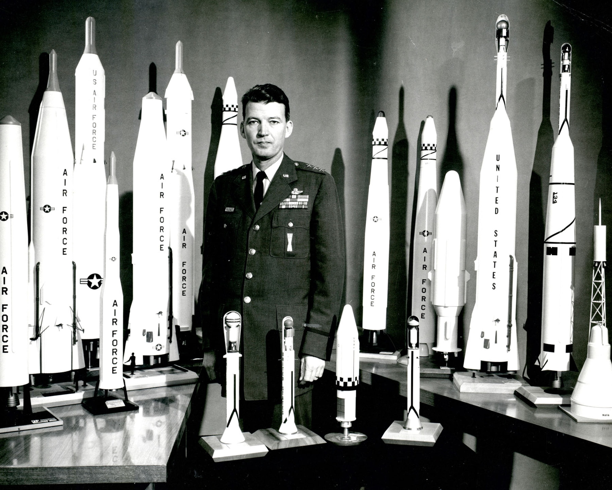 Gen. Bernard Schriever stands with models of some of the systems created under his leadership. Known as the “Father of Air Force space and missiles,” Schriever led the nation’s Intercontinental Ballistic Missile program. Schriever was a regular visitor to Arnold Engineering Development Center during its early years and relied on AEDC for aerodynamic and rocket propulsion data. (U.S. Air Force photo)