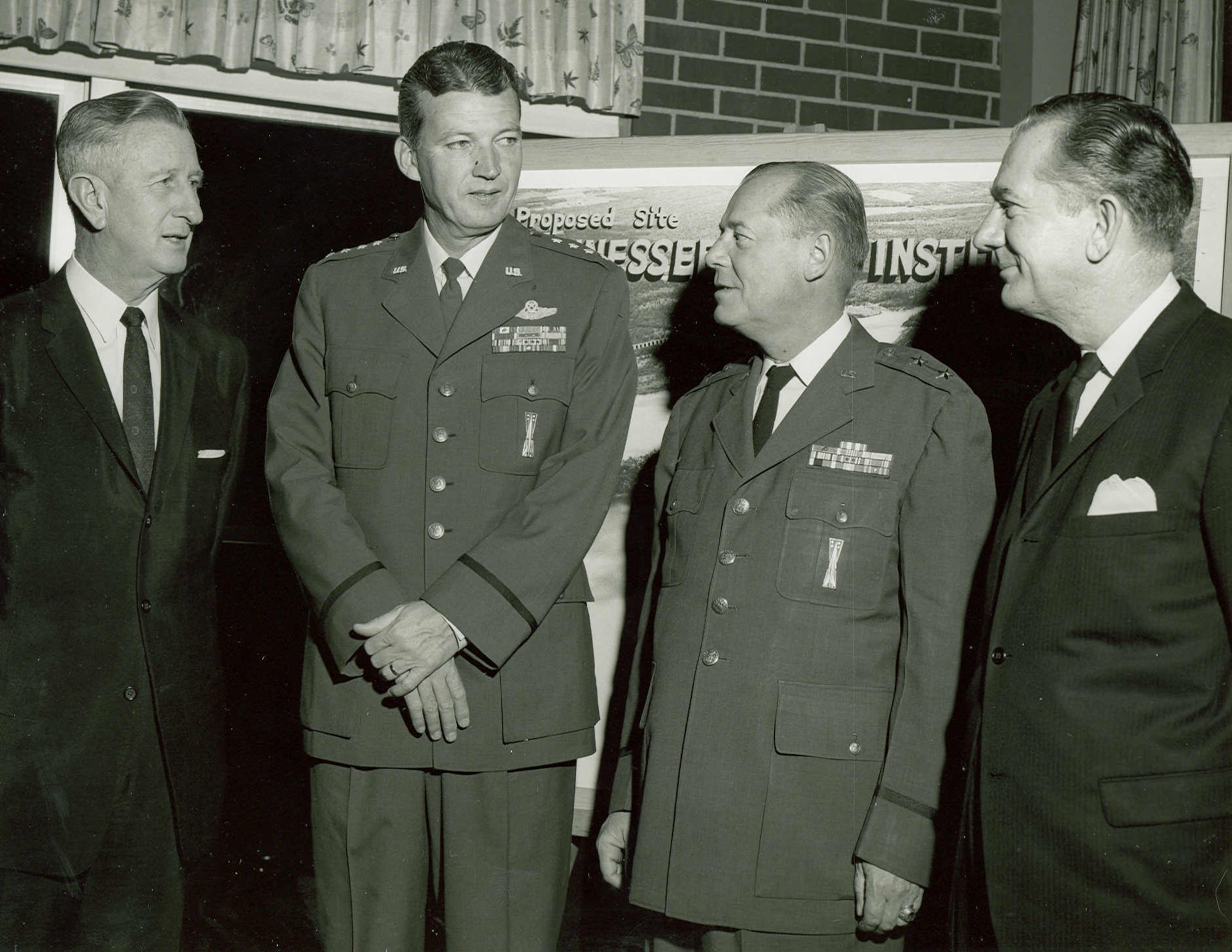Gen. Bernard Schriever, commander of the Air Force Systems Command, second from left, speaks with other attendees of a 1963 dinner at Arnold Engineering Development Center during which the planned University of Tennessee Space Institute was discussed. Known as the “Father of Air Force space and missiles,” Schriever led the nation’s Intercontinental Ballistic Missile program. Schriever was a regular visitor to Arnold Engineering Development Center during its early years and relied on AEDC for aerodynamic and rocket propulsion data. Schriever also supported Air Force research and development. Pictured with Schriever, from left, are then-University of Tennessee President Andrew Holt, then-AEDC Commander Maj. Gen. William Rogers and Tennessee Lt. Gov. James Bomar. (U.S. Air Force photo)