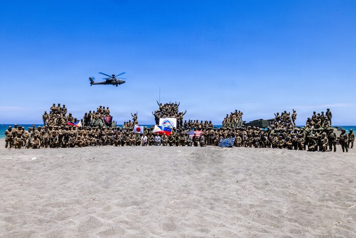Multinational partners pose for a photo after a counter-landing live-fire exercise as part of Exercise Balikatan 2026 at La Paz Sand Dunes, Laoag City, Philippines, May 4, 2026.