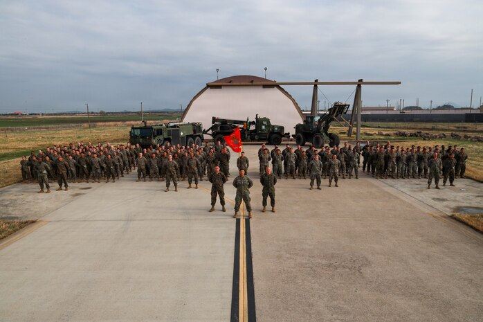 U.S. service members with Marine Wing Support Squadron (MWSS) 174, Marine Aircraft Group 24, 1st Marine Aircraft Wing, pose for a squadron photo on Kunsan Air Base, Jeollabuk-do, South Korea, April 5, 2026.