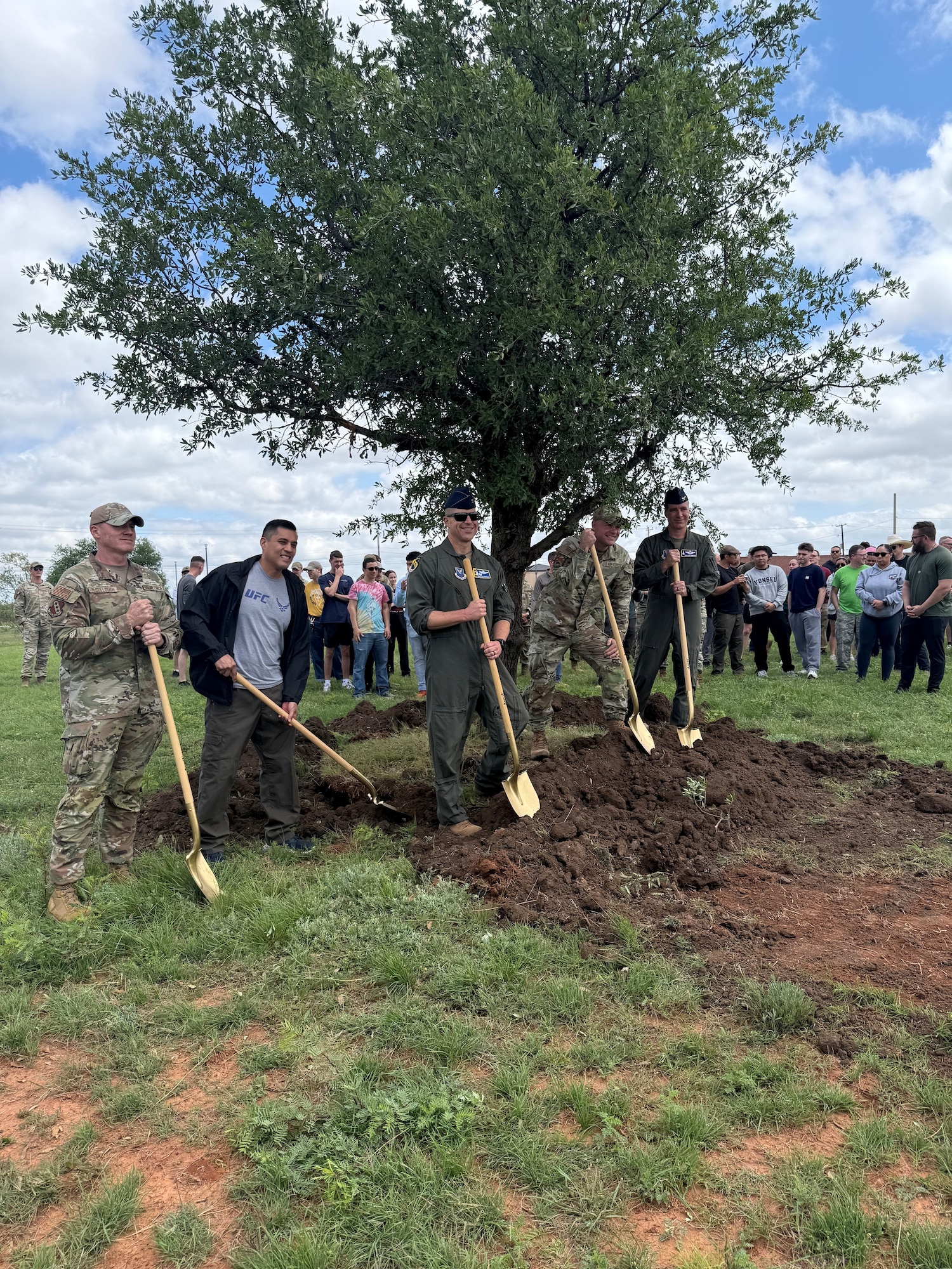 Airmen plant a tree