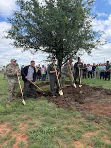 Airmen plant a tree