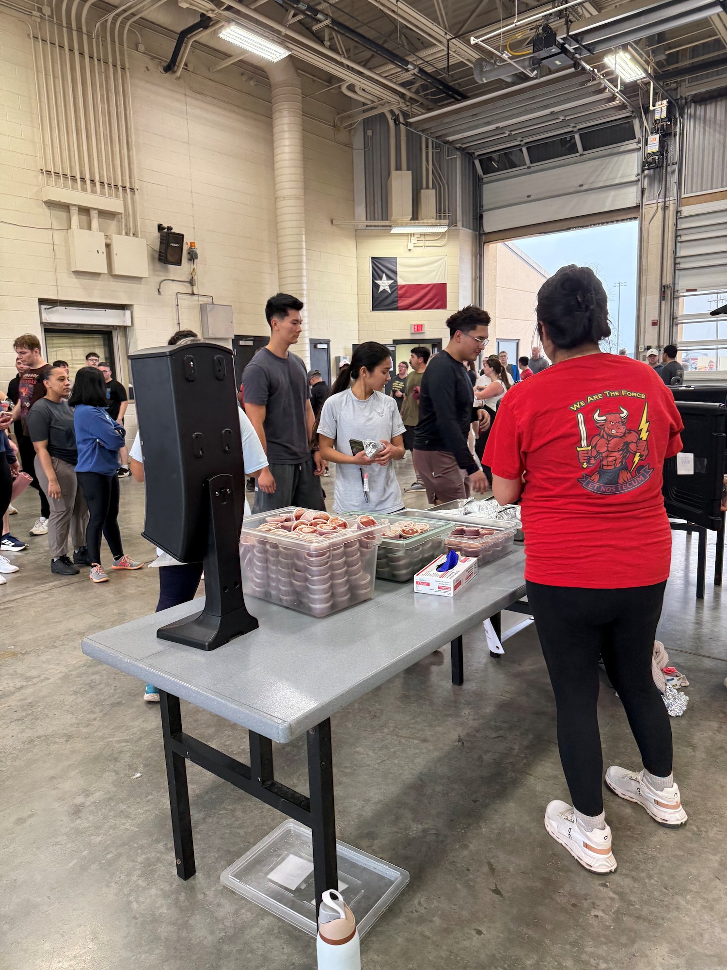 Airmen wait in line for breakfast burritos