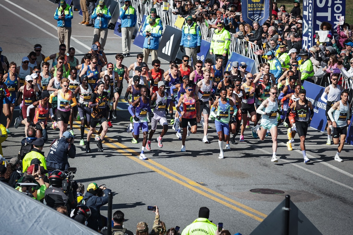 Runners race on a street