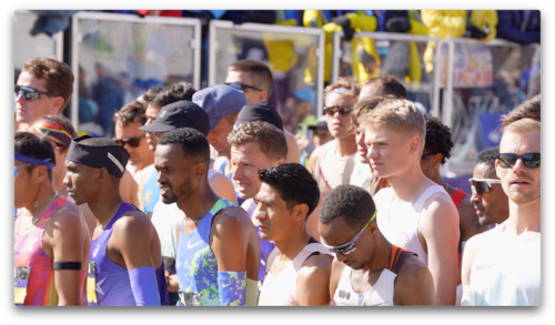 Men stand in a group