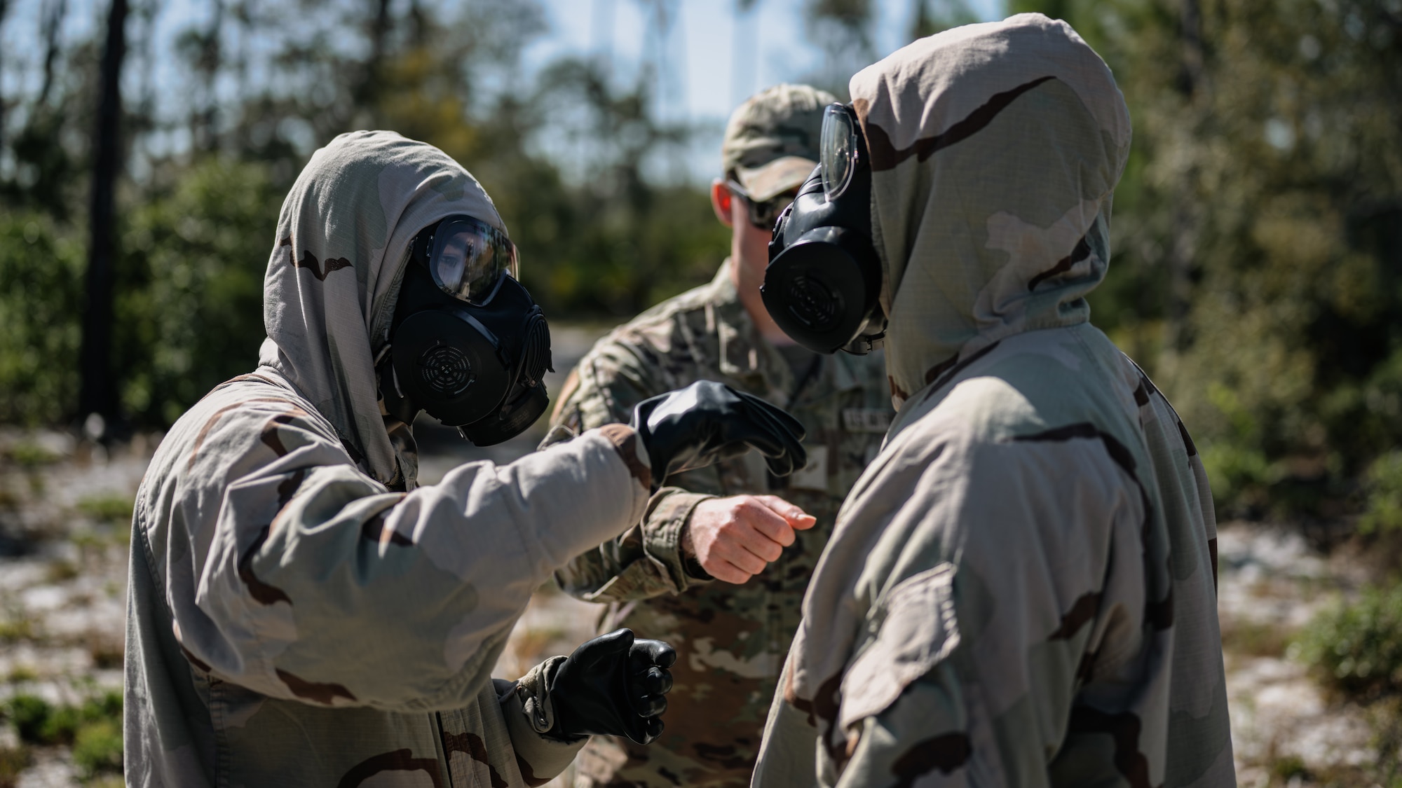 Airmen take off chemical resistance gear