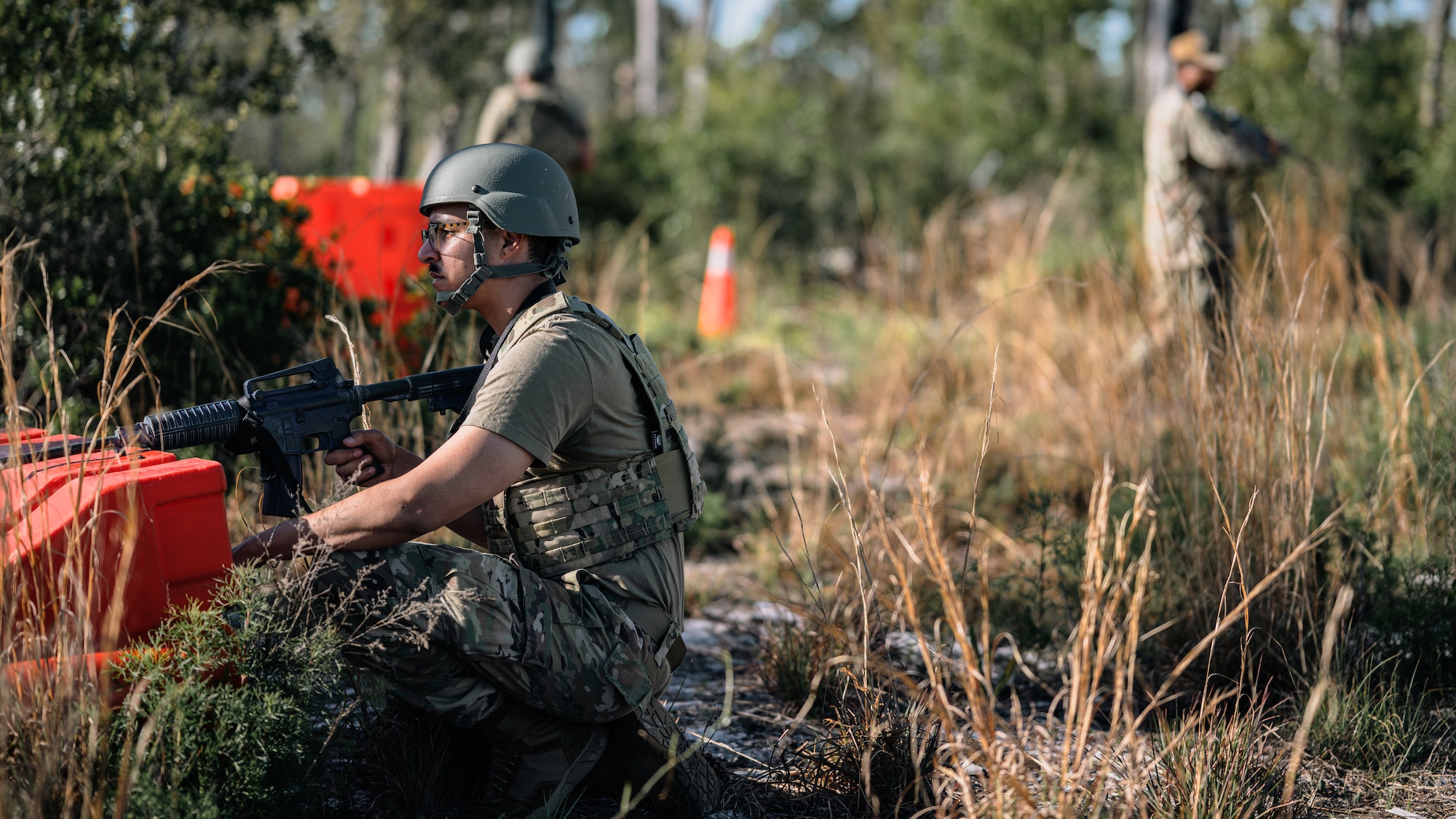 Airmen scout the area for security