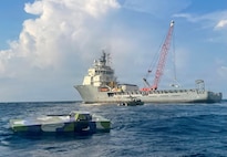 U.S. Indo-Pacific Command (USINDOPACOM) J7 Pacific Multi-Domain Training and Experimentation Capability (PMTEC) offloads a maritime drone target from U.S. Army ocean-contracted vessel MB480 in Palawan, Philippines, prior to the counter-landing live-fire exercise during Exercise Balikatan 2026 on April 27, 2026.