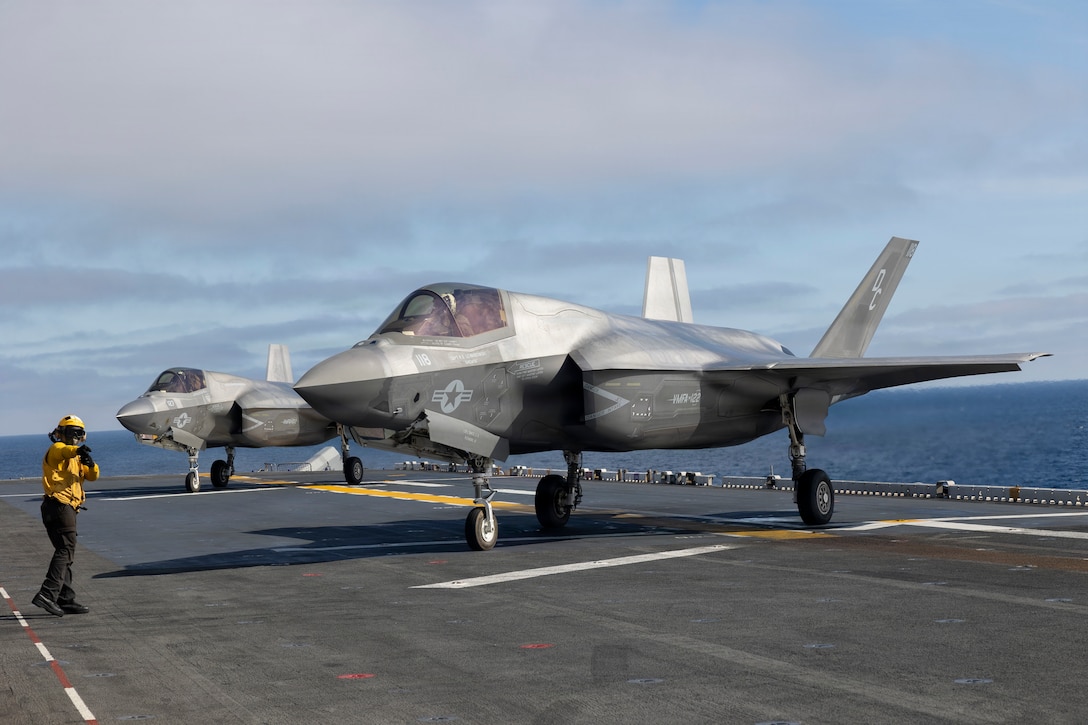 U.S. Marine Corps F-35B Lightning II attached to Marine Fighter Attack Squadron (VMFA) 122, 11th Marine Expeditionary Unit, are staged on the flight deck during flight operations aboard Wasp-class amphibious assault ship USS Boxer (LHD 4) in the Pacific Ocean, March 21, 2026. The 11th MEU is currently underway aboard the Boxer Amphibious Ready Group in the U.S. 3rd Fleet area of operations demonstrating the United States’ long-term commitment to a free and open Indo-Pacific.
