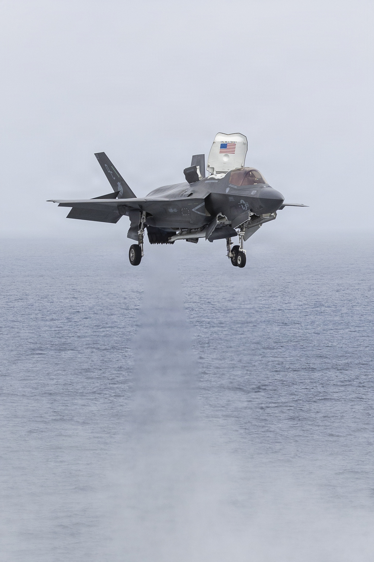 A U.S. Marine Corps F-35B Lightning II attached to Marine Fighter Attack Squadron (VMFA) 122, 11th Marine Expeditionary Unit, prepares to land aboard Wasp-class amphibious assault ship USS Boxer (LHD 4) during flight operations in the Pacific Ocean, March 22, 2026. The 11th MEU is currently underway aboard the Boxer Amphibious Ready Group in the U.S. 3rd Fleet area of operations demonstrating the United States’ long-term commitment to a free and open Indo-Pacific.