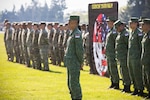 U.S. Soldiers with the Washington National Guard and members of the Singaporean Armed Forces form together for the opening ceremony for Exercise Tiger Balm 2026 at Joint Base Lewis-McChord, Washington, May 4, 2026. Exercise Tiger Balm is an annual U.S. Army Pacific-led bilateral exercise focused on the U.S.-Singapore Armed Forces military-to-military relationship to build combat readiness, strengthen interoperability between the United States and Singapore armies and demonstrate regional security partnership and resolve while enhancing security relations to build a cohesive U.S.-Singapore partnership for a free Indo-Pacific region. Photo by Sgt. Abigail Clark.