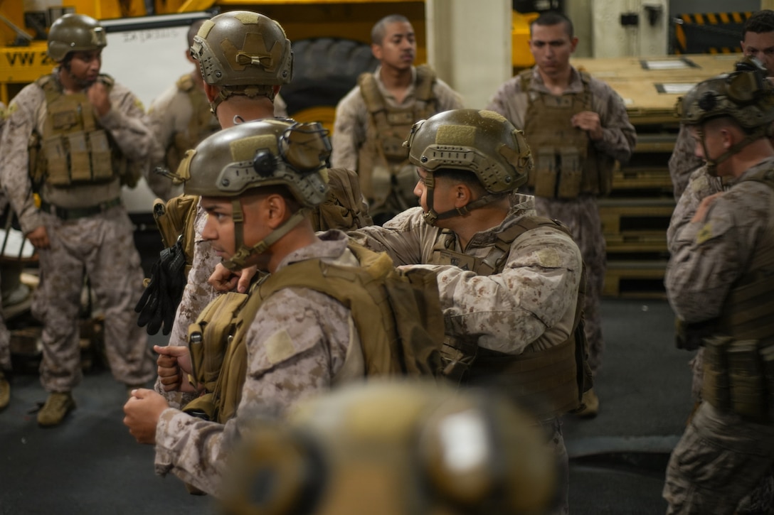 U.S. Marines with Echo Battery, Battalion Landing Team 3/5, 11th Marine Expeditionary Unit, conduct motor transport convoy safety drills aboard San Antonio-class amphibious transport dock ship USS Portland (LPD 27) in the Pacific Ocean, Mar 23, 2026. The 11th MEU is currently underway aboard the Boxer Amphibious Ready Group in the U.S. 3rd Fleet area of operations demonstrating the United States’ long-term commitment to a free and open Indo-Pacific.