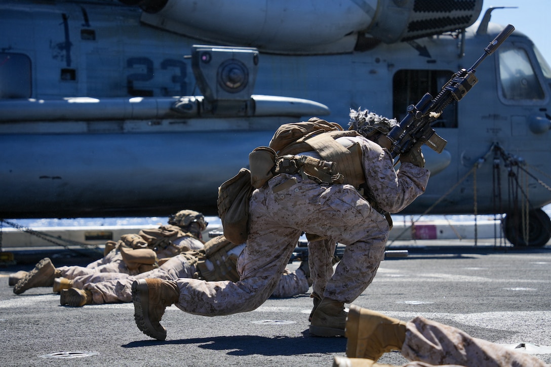 U.S. Marine Corps Lance Cpl. Carlos Robles, a team leader with Lima Company, Battalion Landing Team 3/5, 11th Marine Expeditionary Unit, conducts shoot and move drills aboard San Antonio-class amphibious transport dock ship USS Portland (LPD 27) in the Pacific Ocean, Mar 23, 2026. The 11th MEU is currently underway aboard the Boxer Amphibious Ready Group in the U.S. 3rd Fleet area of operations demonstrating the United States’ long-term commitment to a free and open Indo-Pacific.