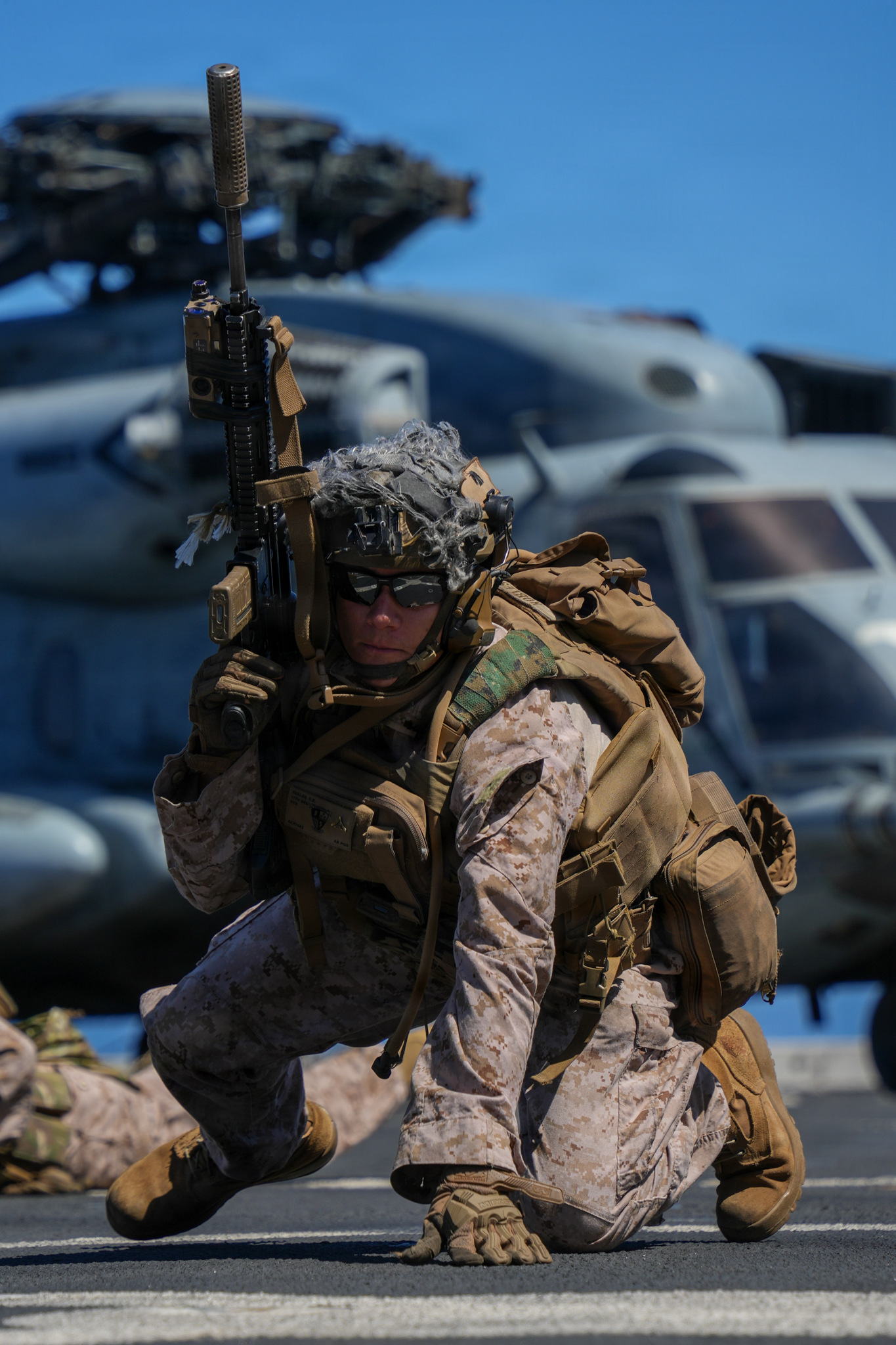 U.S. Marine Corps Lance Cpl. Carlos Robles, a team leader with Lima Company, Battalion Landing Team 3/5, 11th Marine Expeditionary Unit, conducts shoot and move drills aboard San Antonio-class amphibious transport dock ship USS Portland (LPD 27) in the Pacific Ocean, Mar 23, 2026. The 11th MEU is currently underway aboard the Boxer Amphibious Ready Group in the U.S. 3rd Fleet area of operations demonstrating the United States’ long-term commitment to a free and open Indo-Pacific.
