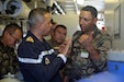 Royal Moroccan Navy service members teach the U.S. Soldiers assigned to the 753rd Quartermaster Company, 687th Combat Sustainment Support Battalion, 103rd Sustainment Command (Expeditionary), about the desalination process used onboard the barge to purify water during African Lion 26 at Cap Draa, Tan-Tan, Morocco, April 24, 2026. The Royal Moroccan Navy integrated with U.S. Soldiers to exchange best practices in tactical reverse osmosis water purification, enhancing multinational readiness and interoperability for sustained water production in austere environments.

AL26 is U.S. Africa Command's largest annual joint exercise, designed to strengthen collective security capabilities of the U.S., African nations and global allies. Led by U.S. Army Southern European Task Force, Africa (SETAF-AF) from April 20 to May 8, 2026, and hosted in Ghana, Morocco, Senegal and Tunisia, AL26 involves over 5,600 civilian and military personnel from more than 40 nations, using innovation to drive partner-led regional security. (U.S. Army photo by Sgt. 1st Class Rodney Roldan)