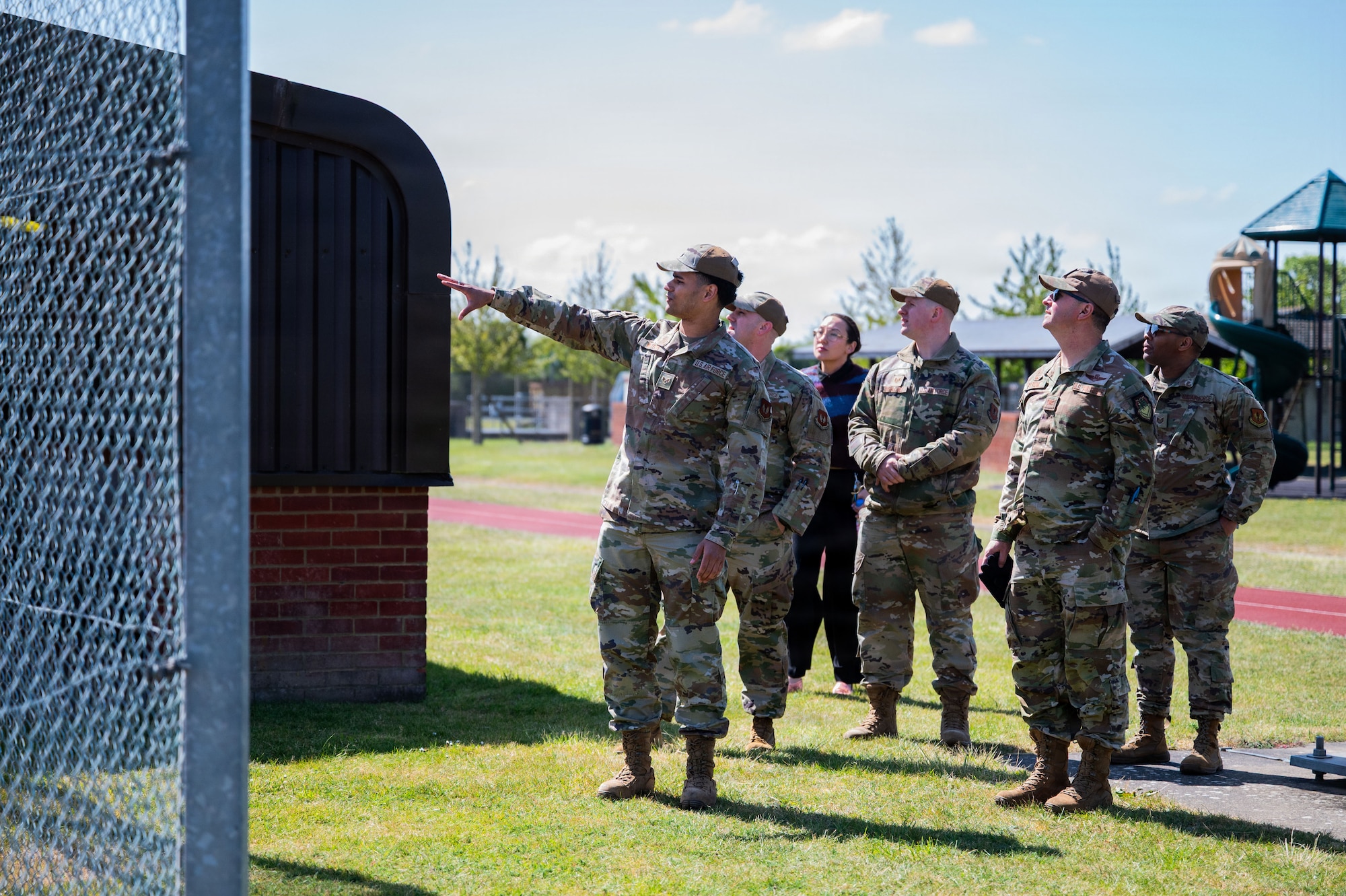 U.S. Air Force Senior Airman Savion Watson, 100th Communications Squadron agile combat employment technician, points toward a communications display during a day in the life integration at RAF Mildenhall, England, April 28, 2026.