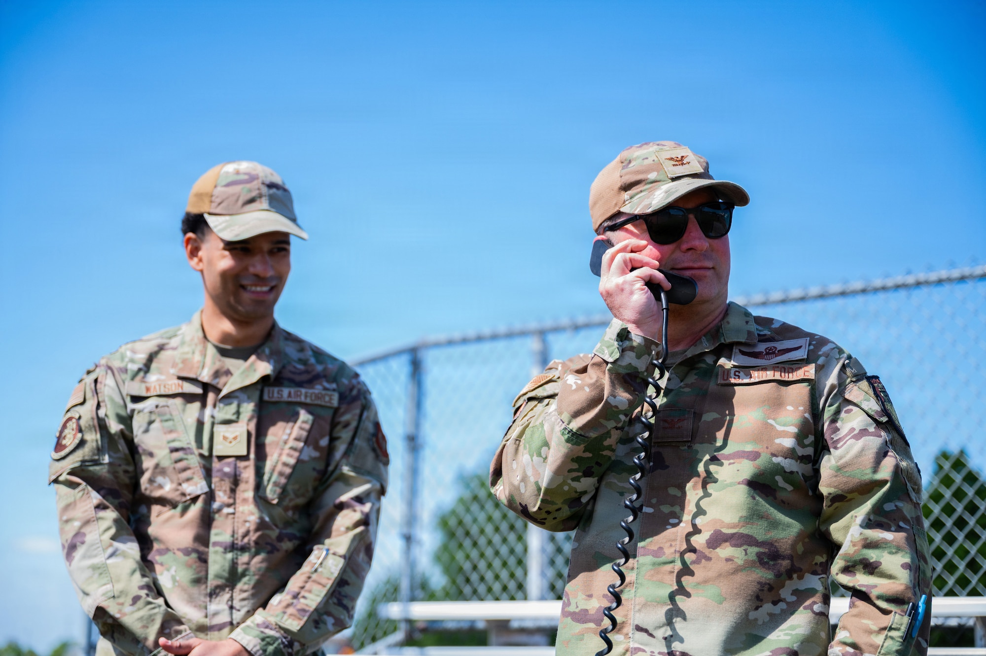 U.S. Air Force Col. Steven Byrum, 100th Air Refueling Wing commander and Senior Airman Savion Watson, 100th Communications Squadron agile combat employment technician, perform a radio check on a Perc-160 (v) tasker radio during a day in the life integration at RAF Mildenhall, England, April 28, 2026.