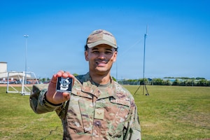 U.S. Air Force Senior Airman Savion Watson, 100th Communications Squadron agile combat employment technician, poses during a day in the life integration at RAF Mildenhall, England, April 28, 2026.